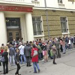 Докато опашките се виеха пред банковите сгради на КТБ