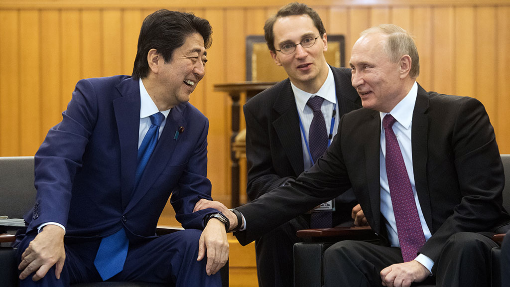 путин шиндзо абе
