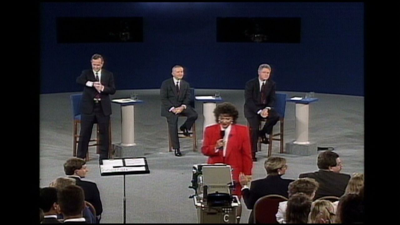 121001092247 debate fun bush checks watch 00000415