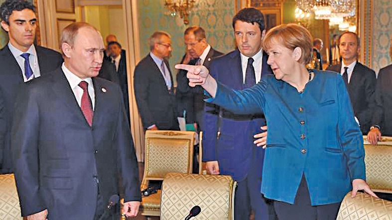Германският канцлер Ангела Меркел обвинява руския президент Владимир Путин за конфликта в Украйна на събирането в Милано на 17 октомври.