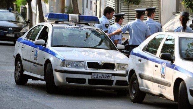 полиция Атина