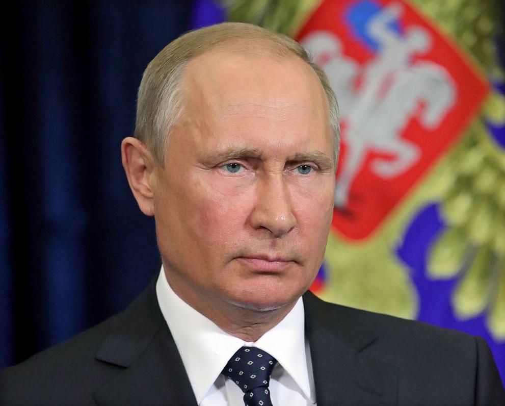 Путин
