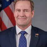 Official_Portrait_of_UN_Ambassador_Mike_Waltz_Майк Уолц