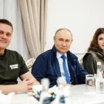 Путин