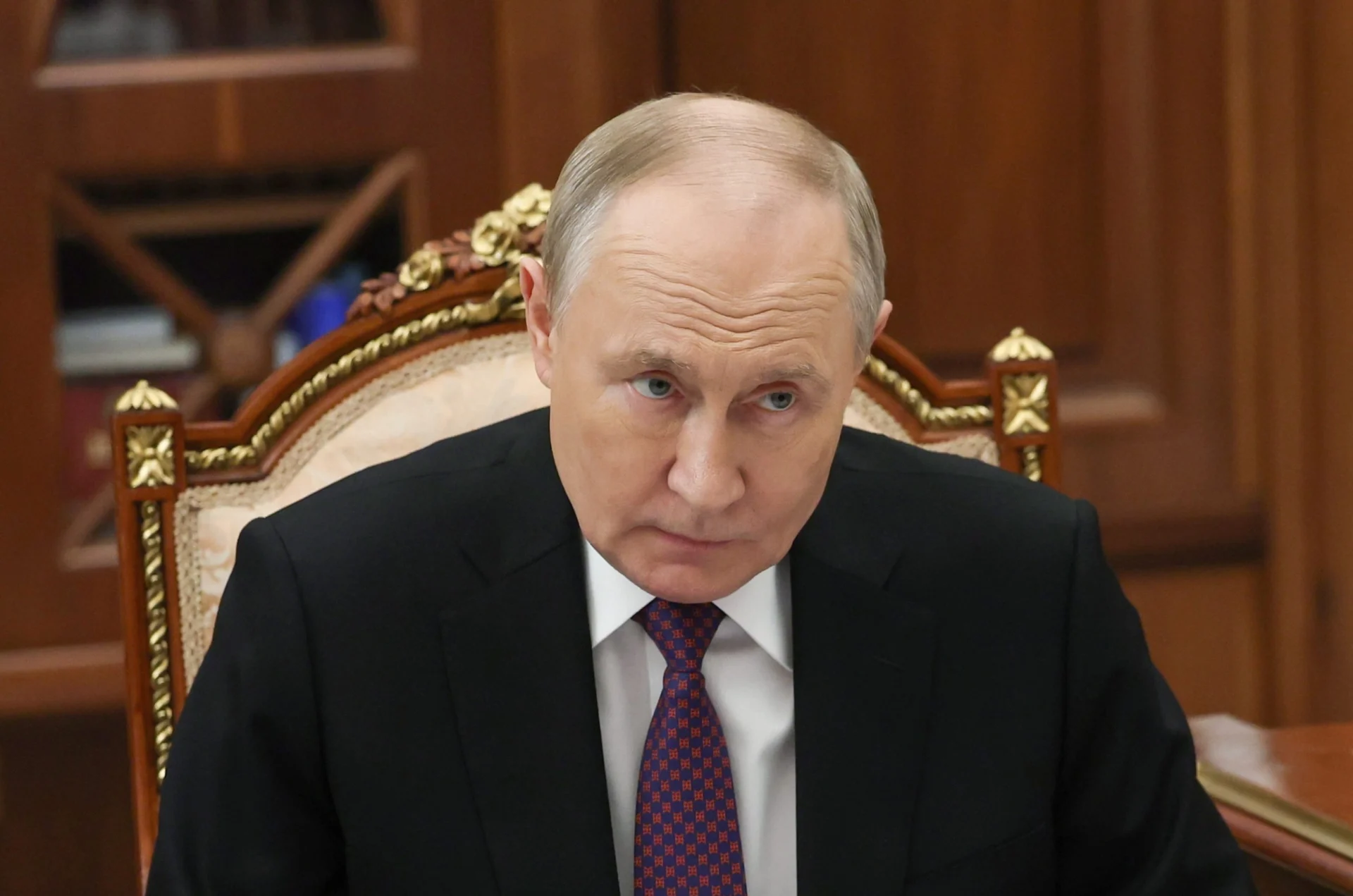 Путин